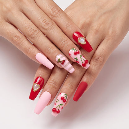 Auntie Cookies Nails: Coffin press-on nails in pink, red, and striped designs with cherry and heart charms.