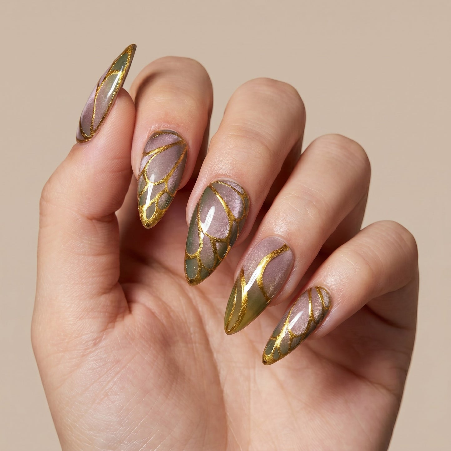 Auntie Cookies Nails Forest Fairy press on nails with almond shape, forest green tones, and gold butterfly wing details.