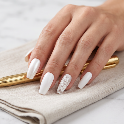 Auntie Cookies Nails ivory coffin press-on nails with pearlescent, solid gloss, and intricate lace accent designs.