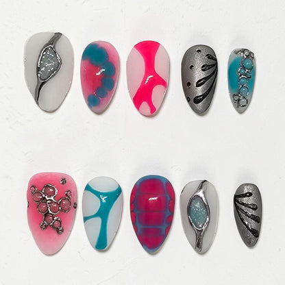 Auntie Cookies Nails Neon Aura press-on set featuring neon pink, electric blue, and metallic silver 3D abstract art.