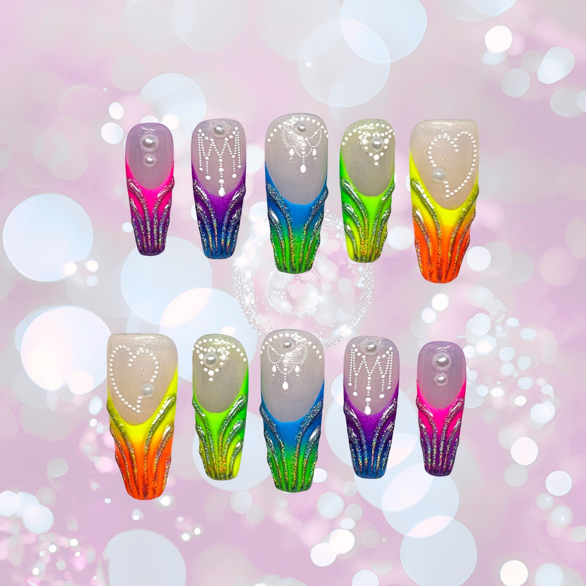 Auntie Cookies Nails: Vibrant gradient press-on nails with glitter, pearl, and bead accents in orange, green, blue, and purple.