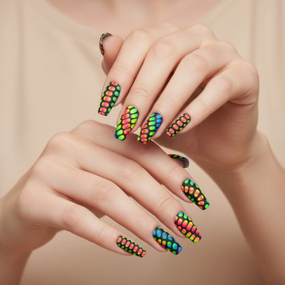 Auntie Cookies Nails: Black stiletto press-on nails with a vibrant rainbow gradient dot pattern and matte finish.